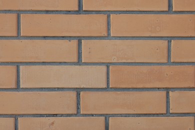 Photo of Texture of red brick wall as background, closeup