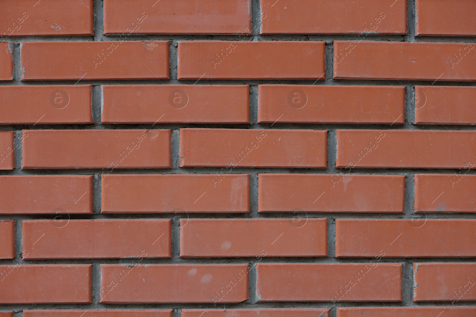 Photo of Texture of red brick wall as background, closeup