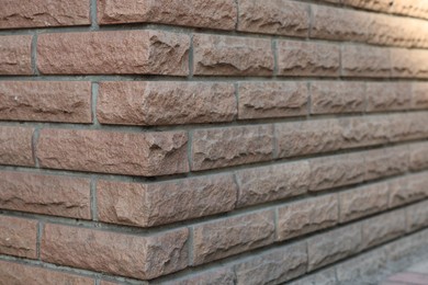 Photo of Texture of red brick wall as background, closeup