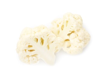 Photo of Pieces of fresh cauliflower florets isolated on white, top view