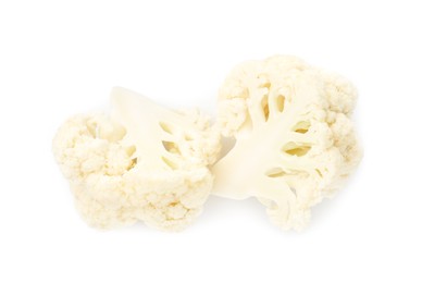Photo of Pieces of fresh cauliflower florets isolated on white, top view