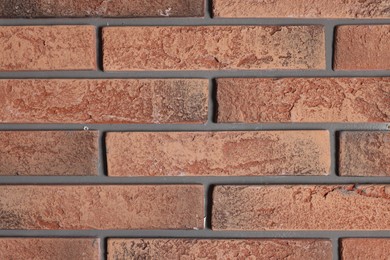 Photo of Texture of red brick wall as background, closeup