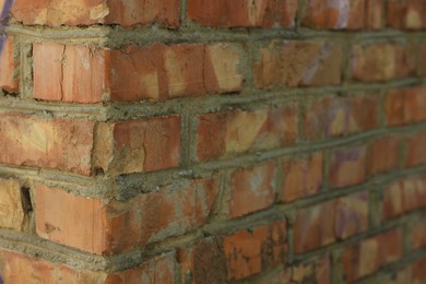 Photo of Texture of old red brick wall as background, closeup