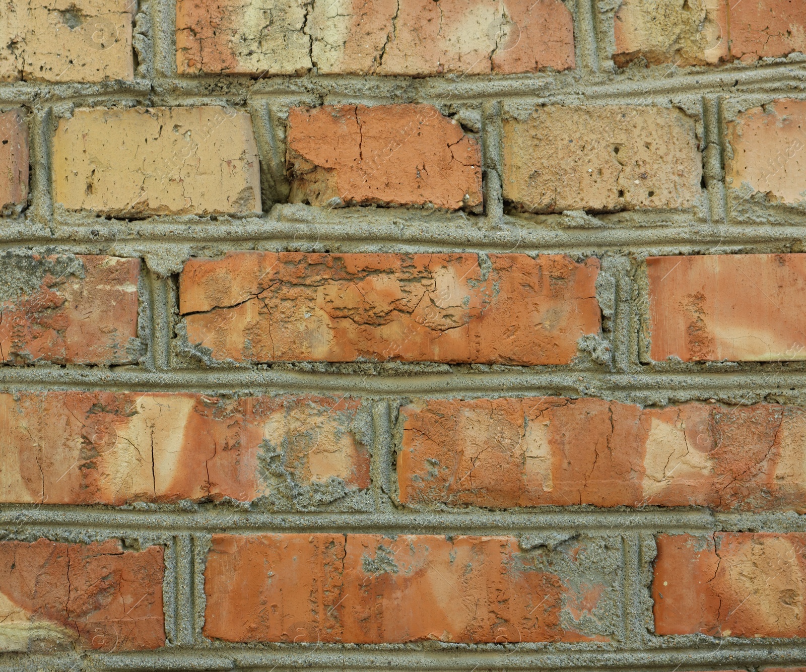 Photo of Texture of old red brick wall as background, closeup