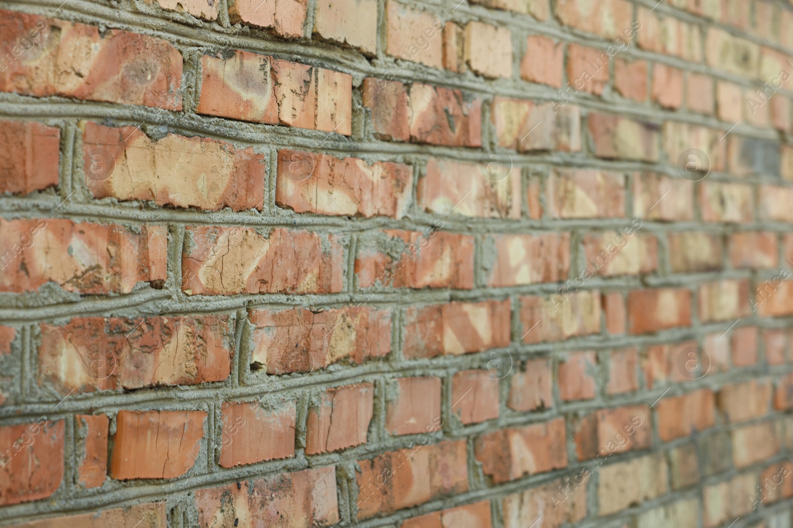 Photo of Texture of old red brick wall as background, closeup