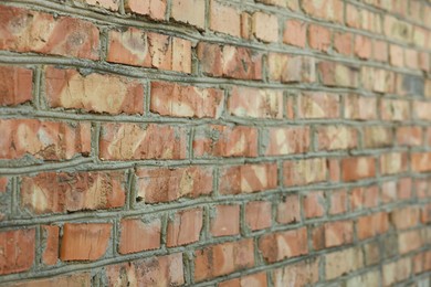 Photo of Texture of old red brick wall as background, closeup