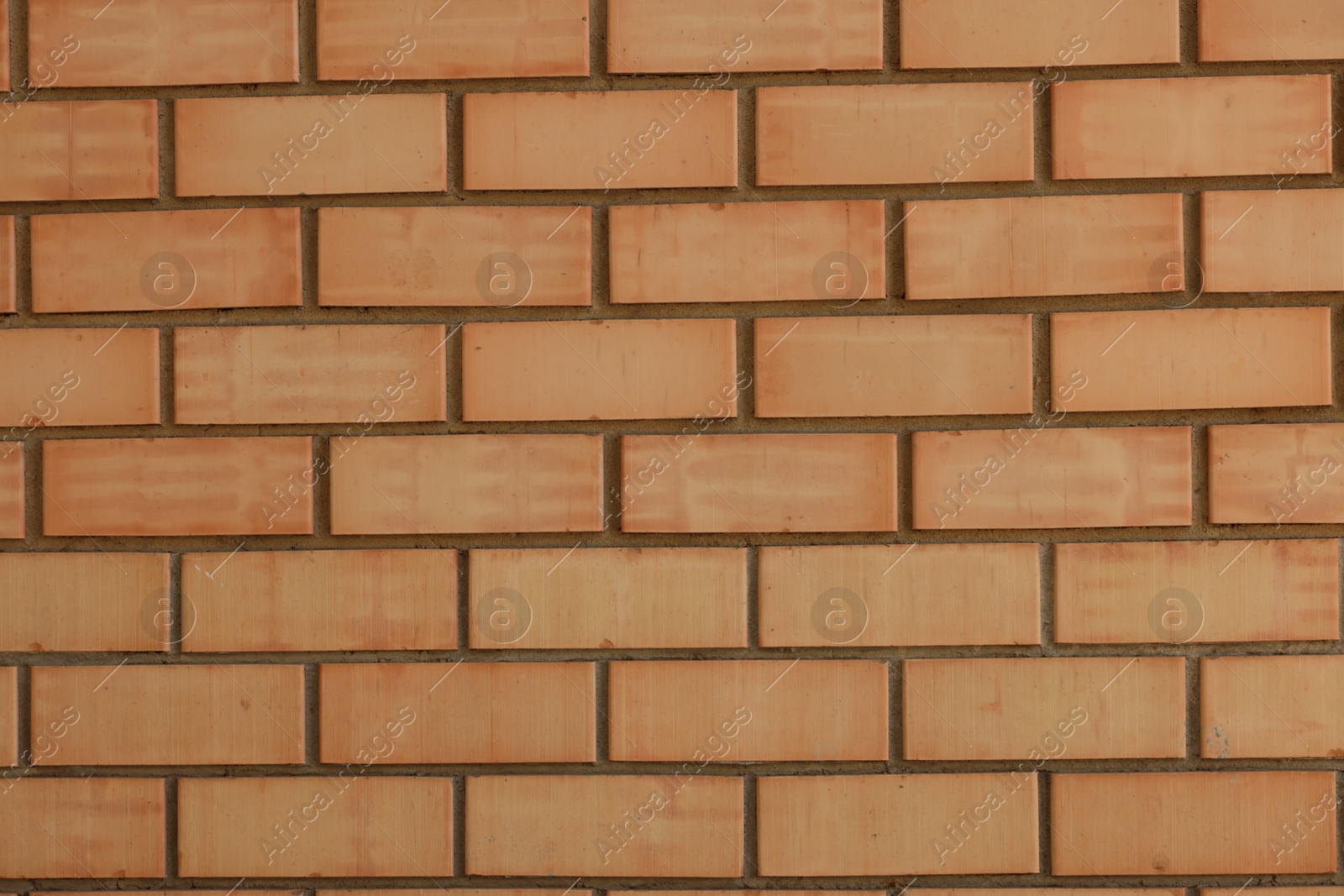 Photo of Texture of red brick wall as background, closeup