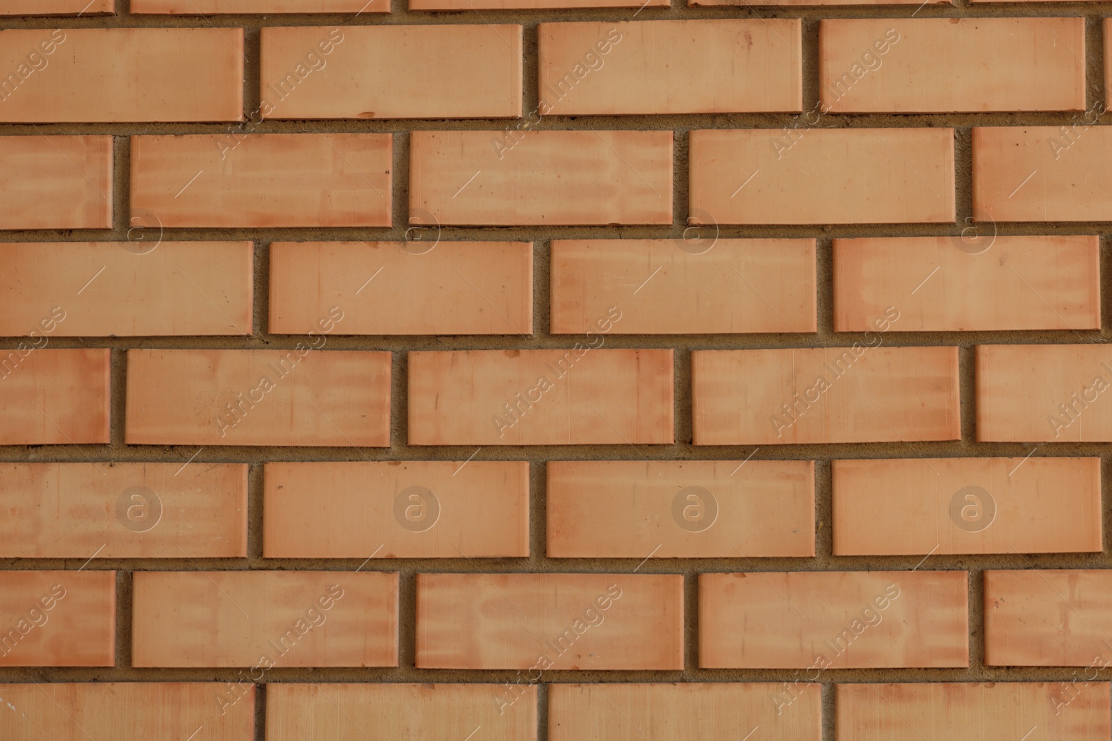 Photo of Texture of red brick wall as background, closeup