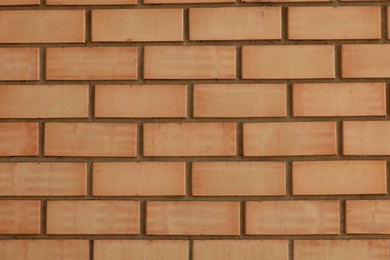Photo of Texture of red brick wall as background, closeup
