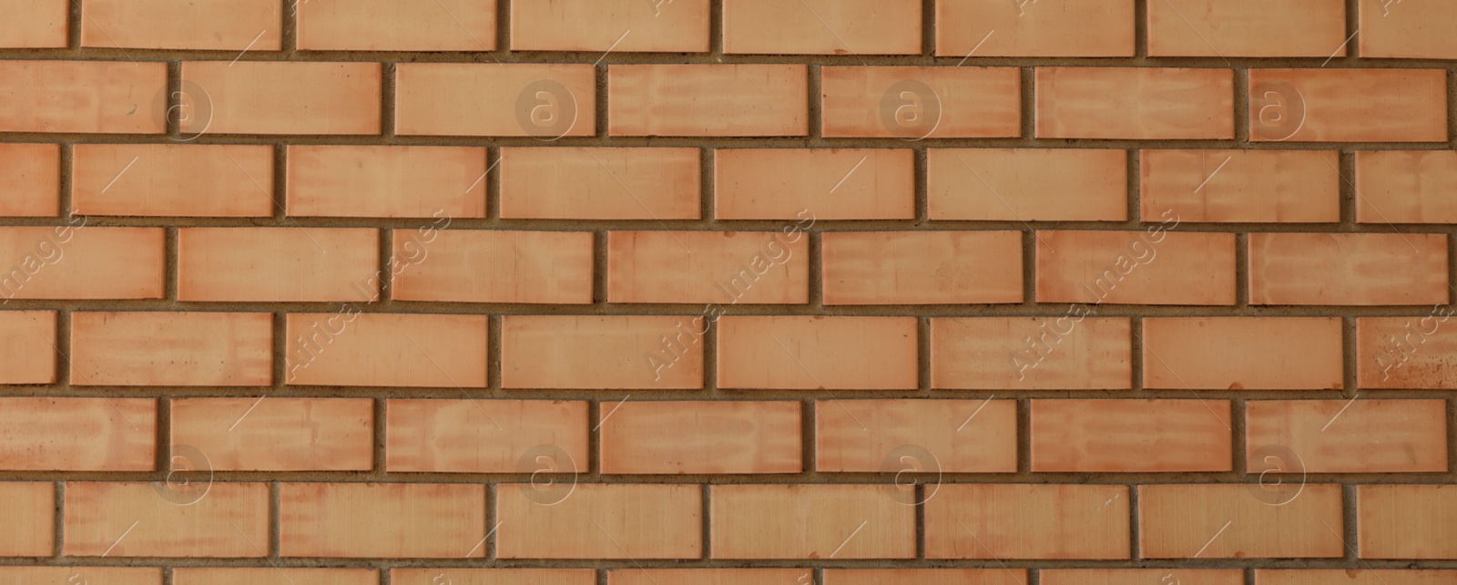 Photo of Texture of red brick wall as background, closeup