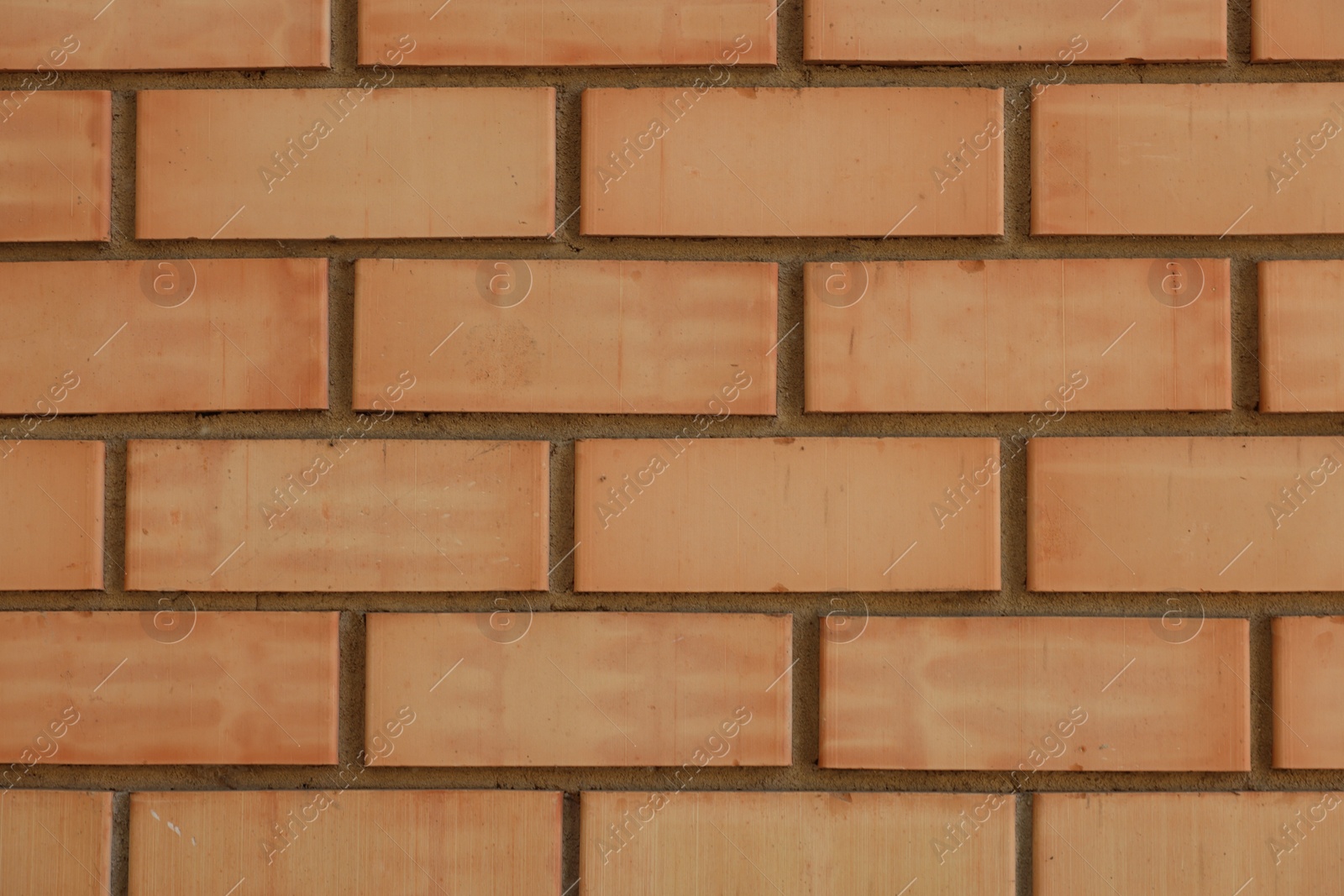 Photo of Texture of red brick wall as background, closeup
