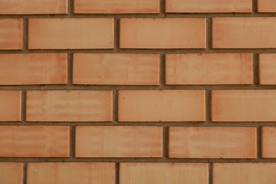 Photo of Texture of red brick wall as background, closeup