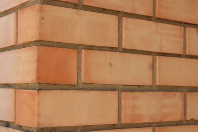 Photo of Texture of red brick wall as background, closeup