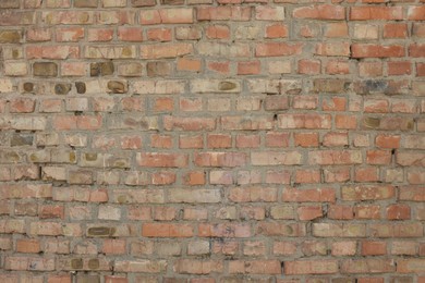 Photo of Texture of old red brick wall as background, closeup