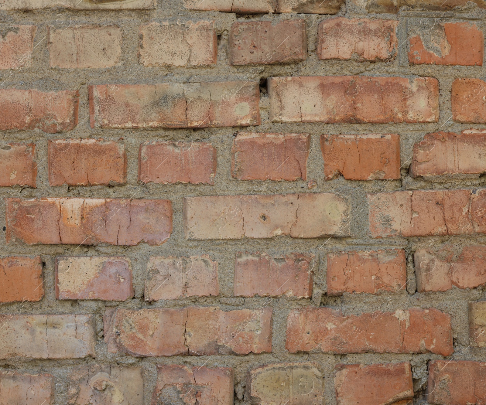 Photo of Texture of old red brick wall as background, closeup