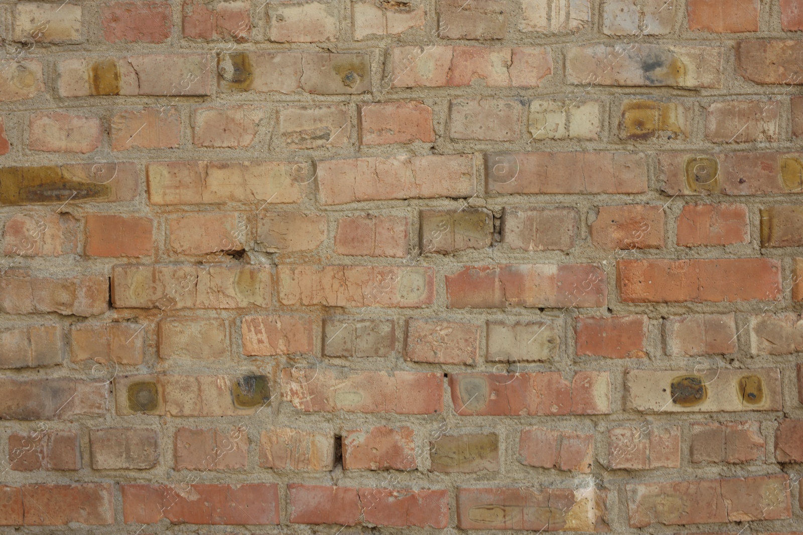 Photo of Texture of old red brick wall as background, closeup