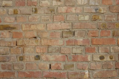 Photo of Texture of old red brick wall as background, closeup