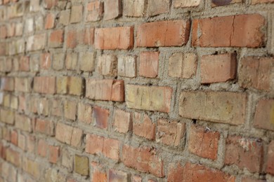 Photo of Texture of old red brick wall as background, closeup
