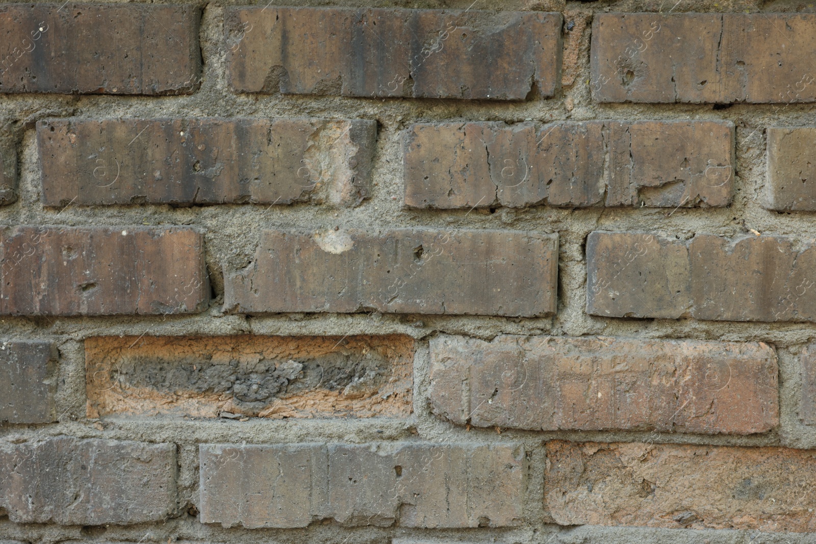 Photo of Texture of old brick wall as background, closeup