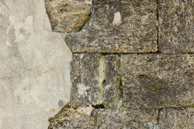 Photo of Texture of old brick wall as background, closeup