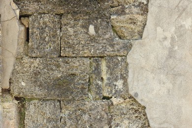 Photo of Texture of old brick wall as background, closeup