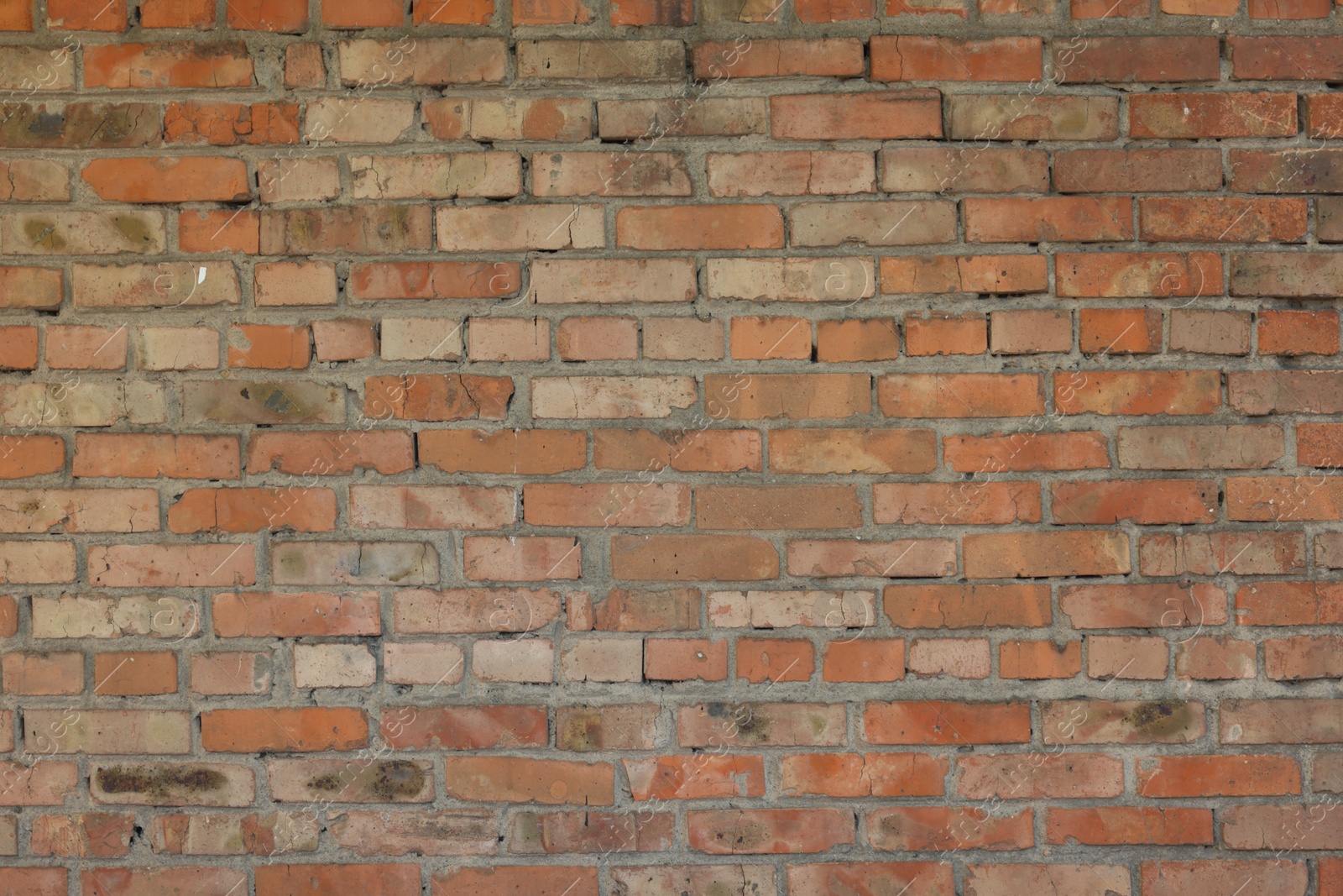 Photo of Texture of red brick wall as background, closeup