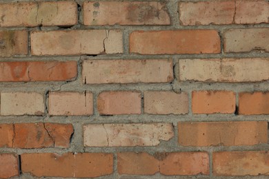 Photo of Texture of red brick wall as background, closeup
