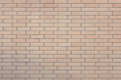 Photo of Texture of red brick wall as background, closeup