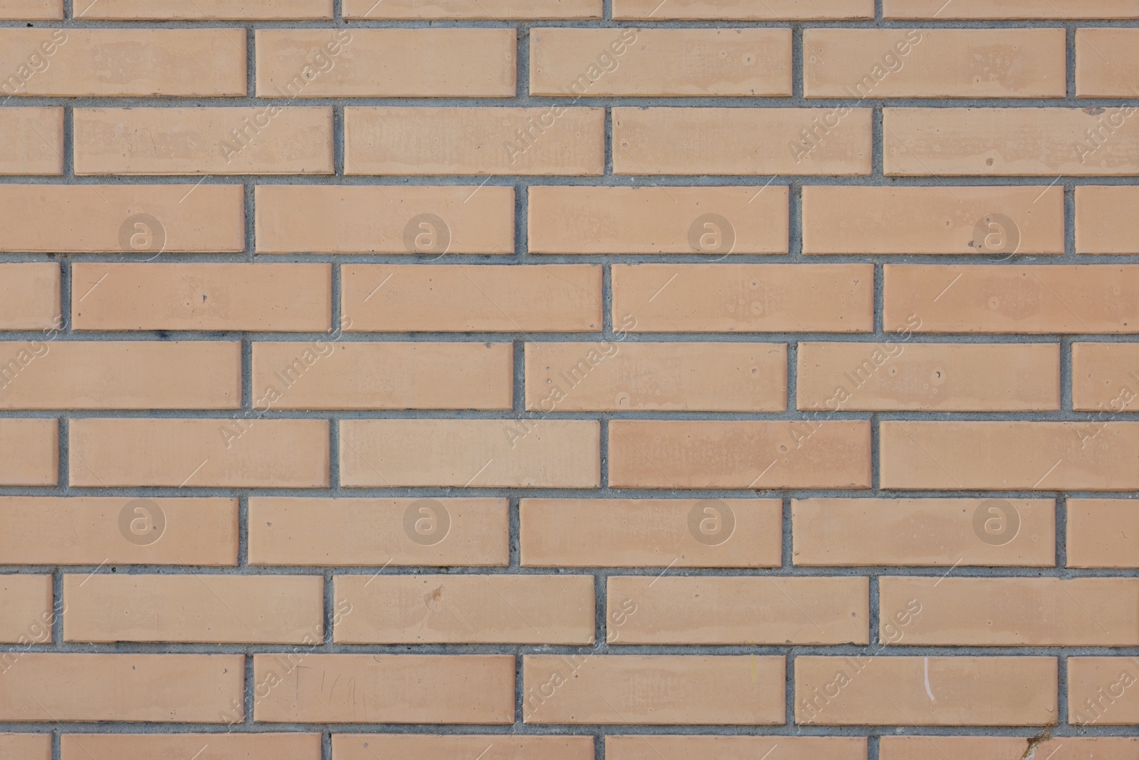 Photo of Texture of red brick wall as background, closeup