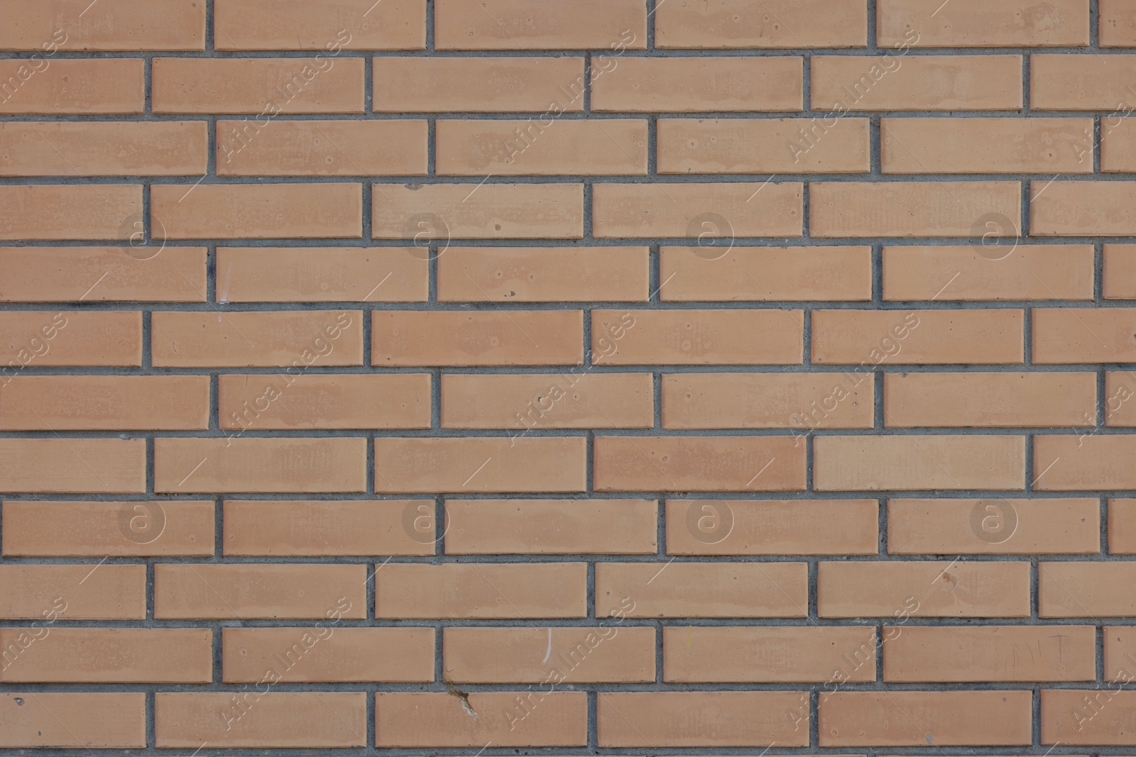 Photo of Texture of red brick wall as background, closeup