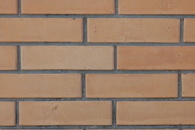 Photo of Texture of red brick wall as background, closeup