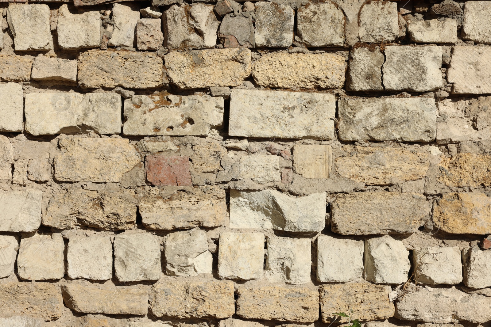 Photo of Texture of old brick wall as background, closeup