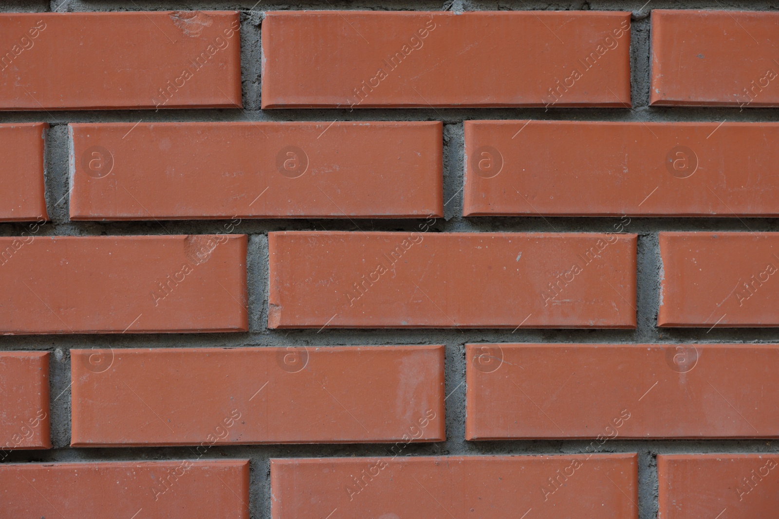 Photo of Texture of red brick wall as background, closeup