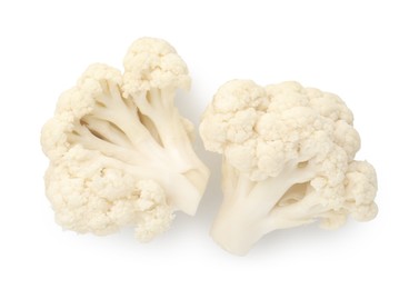 Photo of Fresh raw cauliflower florets isolated on white, top view