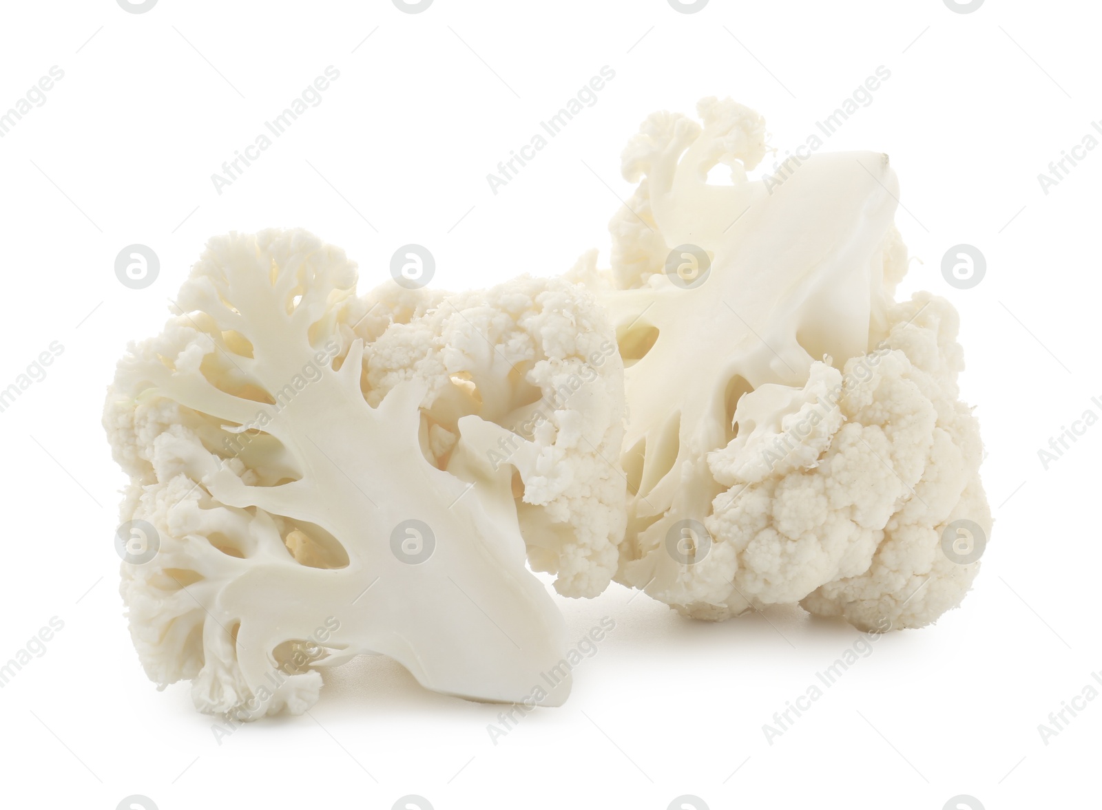 Pieces of fresh cauliflower florets isolated on white Photo of Pieces of fresh cauliflower florets isolated on white