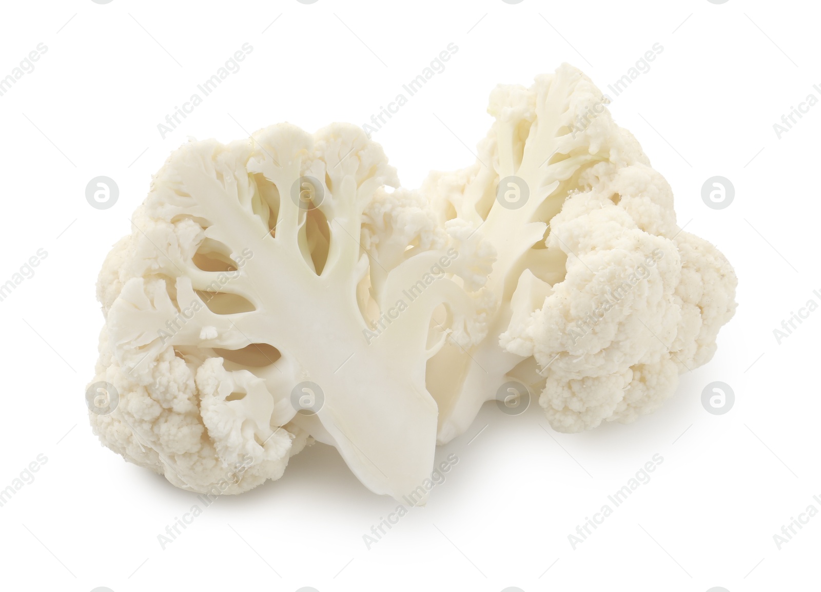 Photo of Pieces of fresh cauliflower florets isolated on white