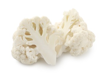 Photo of Pieces of fresh cauliflower florets isolated on white