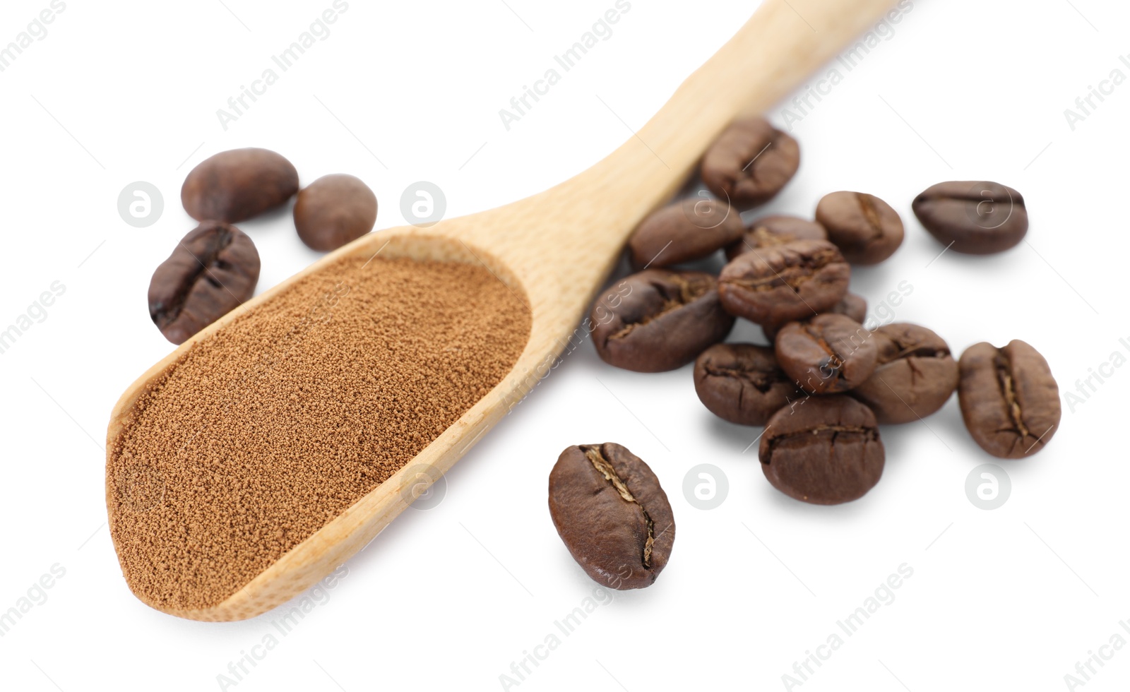 Wooden spoon with instant coffee and beans isolated on white Photo of Wooden spoon with instant coffee and beans isolated on white