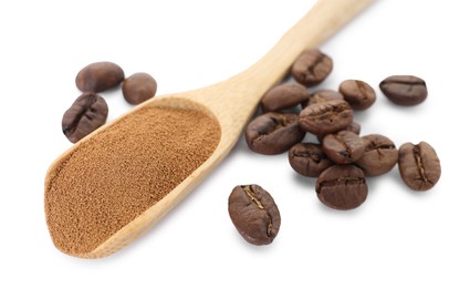 Photo of Wooden spoon with instant coffee and beans isolated on white