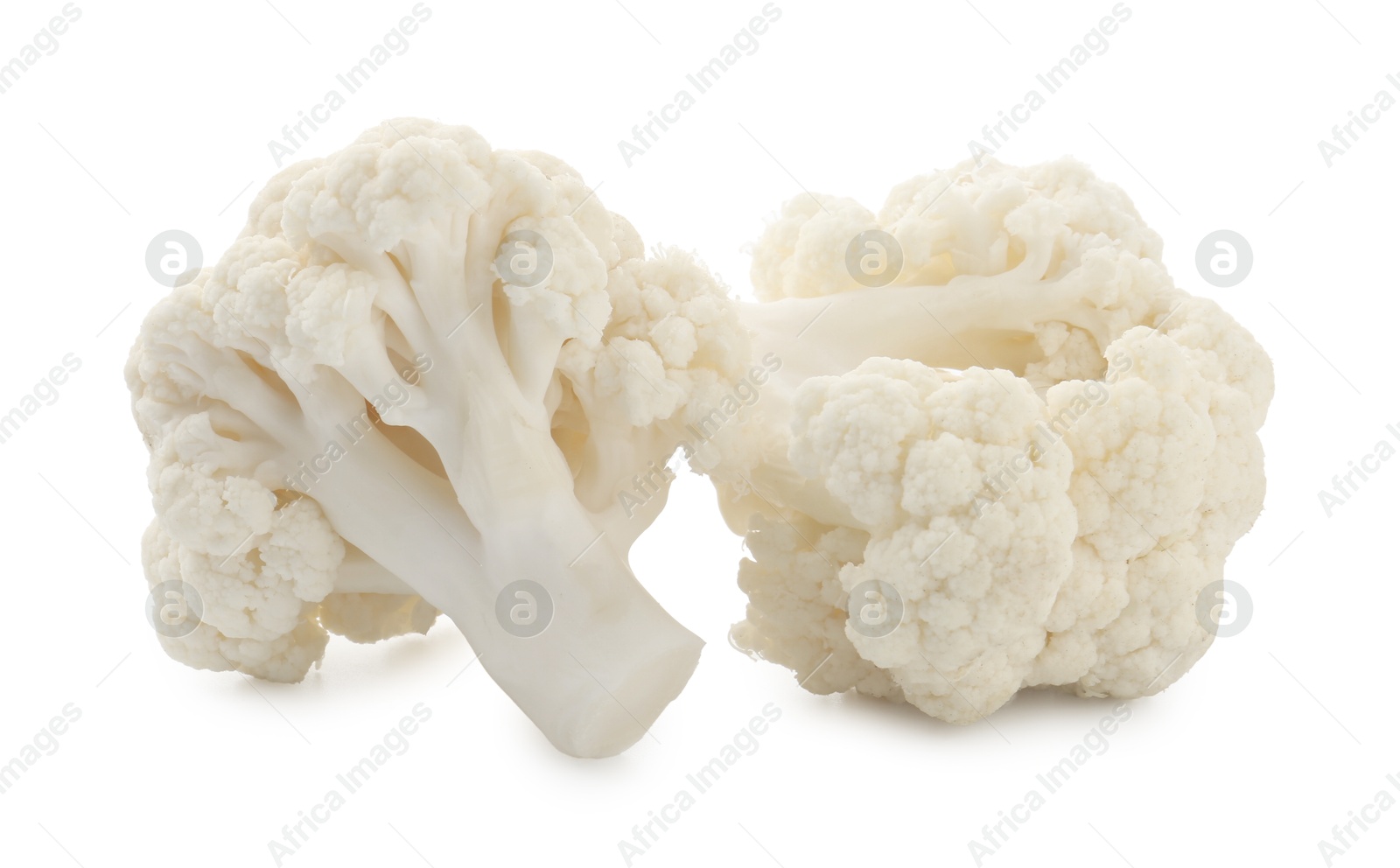 Fresh raw cauliflower florets isolated on white Photo of Fresh raw cauliflower florets isolated on white