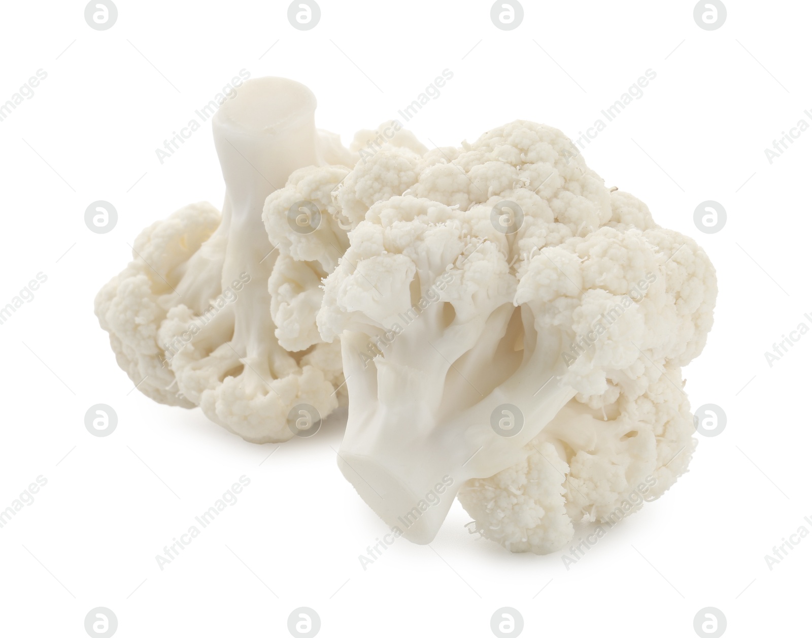 Fresh raw cauliflower florets isolated on white Photo of Fresh raw cauliflower florets isolated on white