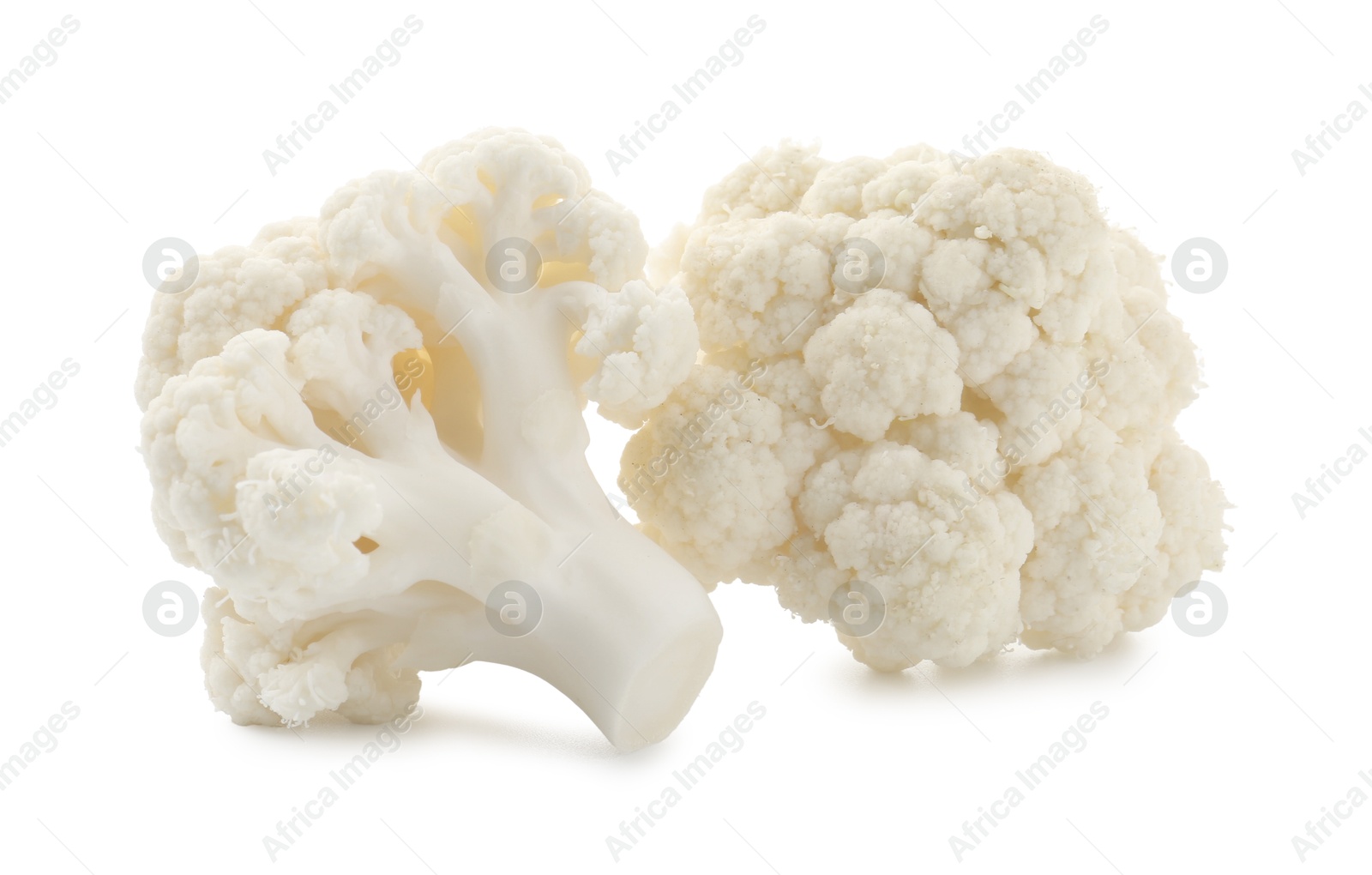 Fresh raw cauliflower florets isolated on white Photo of Fresh raw cauliflower florets isolated on white