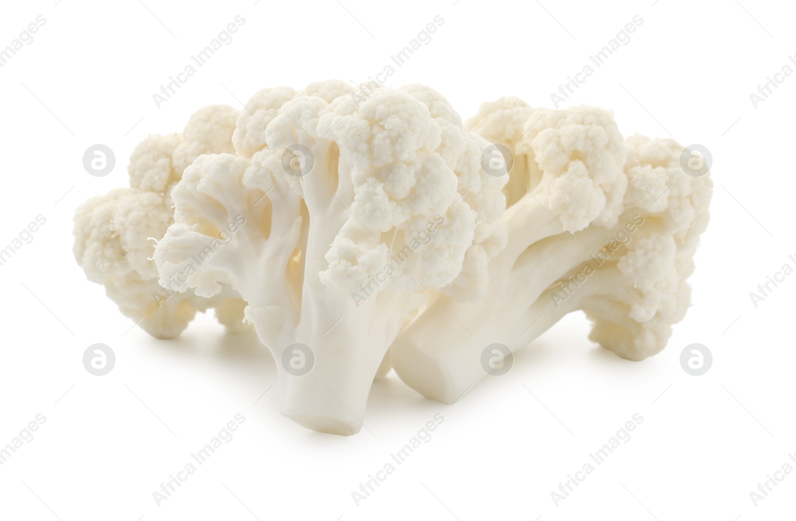 Fresh raw cauliflower florets isolated on white Photo of Fresh raw cauliflower florets isolated on white