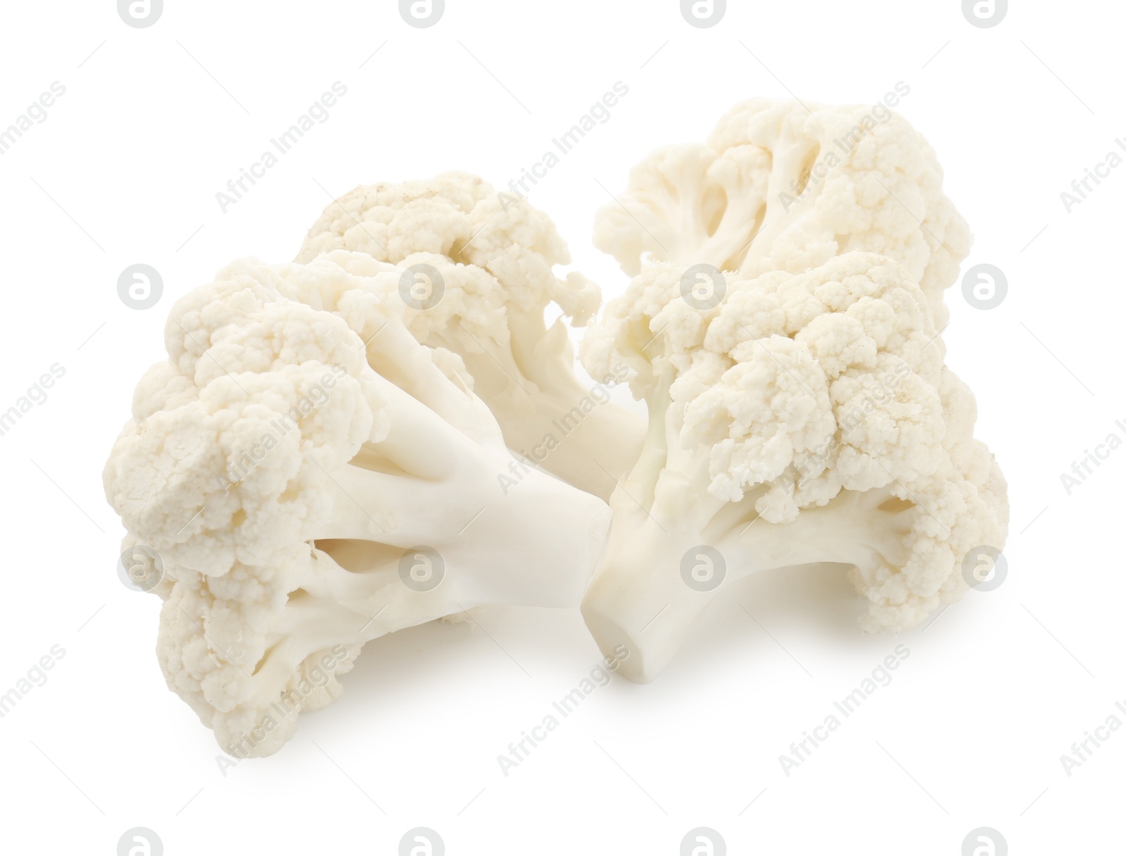 Fresh raw cauliflower florets isolated on white Photo of Fresh raw cauliflower florets isolated on white