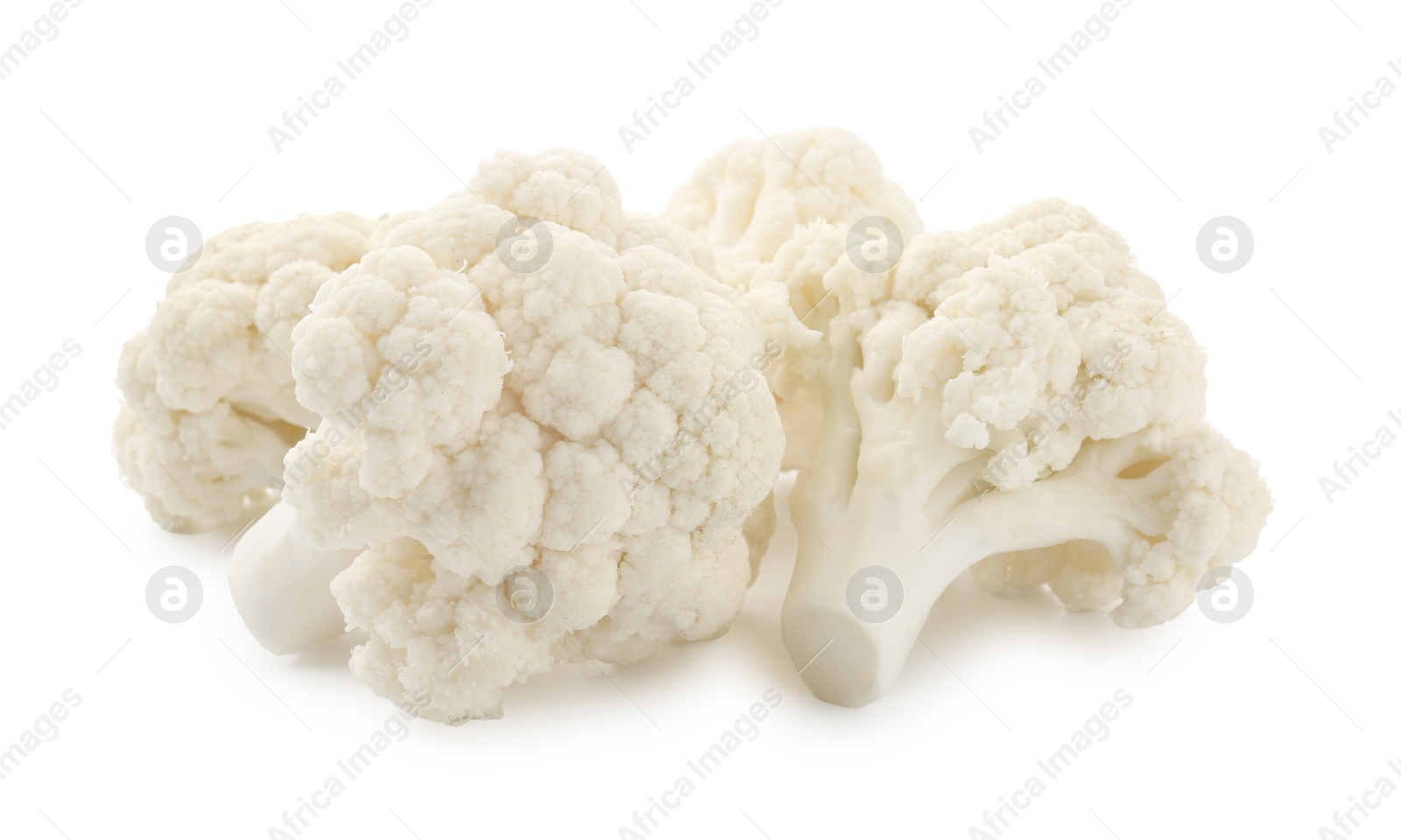 Fresh raw cauliflower florets isolated on white Photo of Fresh raw cauliflower florets isolated on white