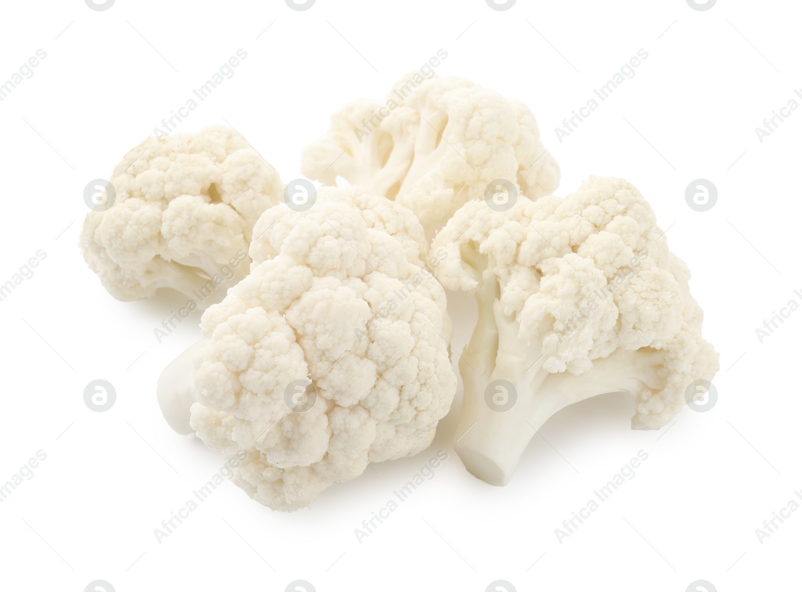 Fresh raw cauliflower florets isolated on white Photo of Fresh raw cauliflower florets isolated on white