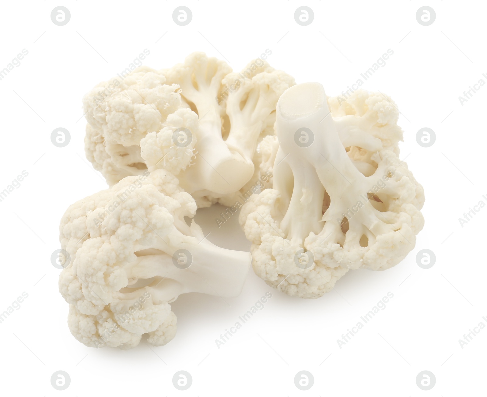 Fresh raw cauliflower florets isolated on white Photo of Fresh raw cauliflower florets isolated on white