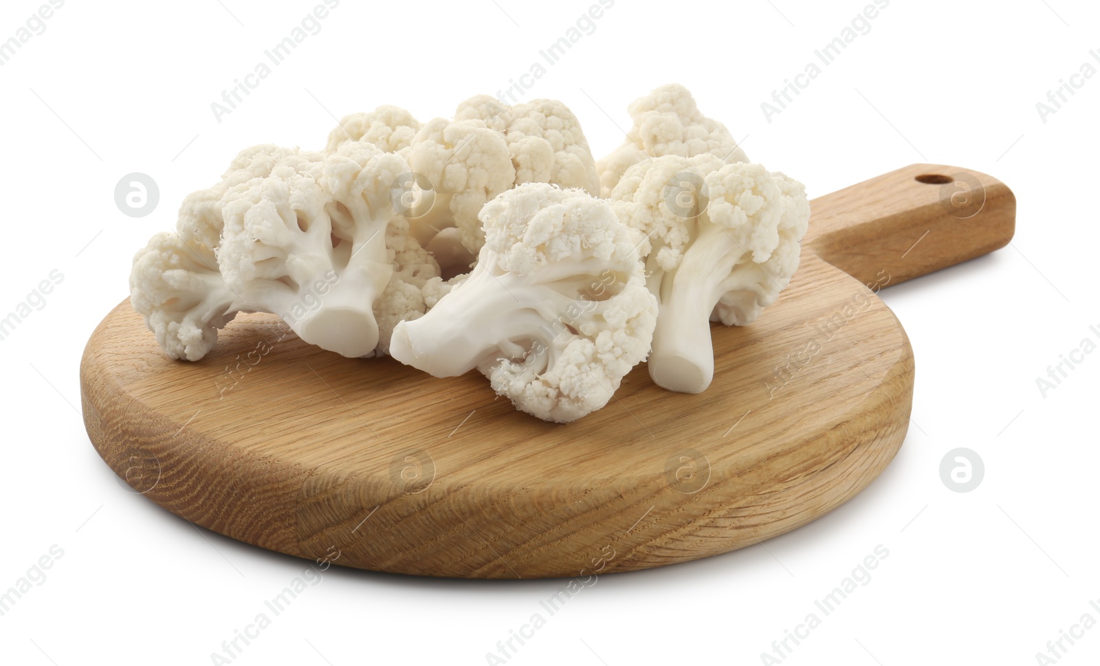 Fresh raw cauliflower florets isolated on white Photo of Fresh raw cauliflower florets isolated on white