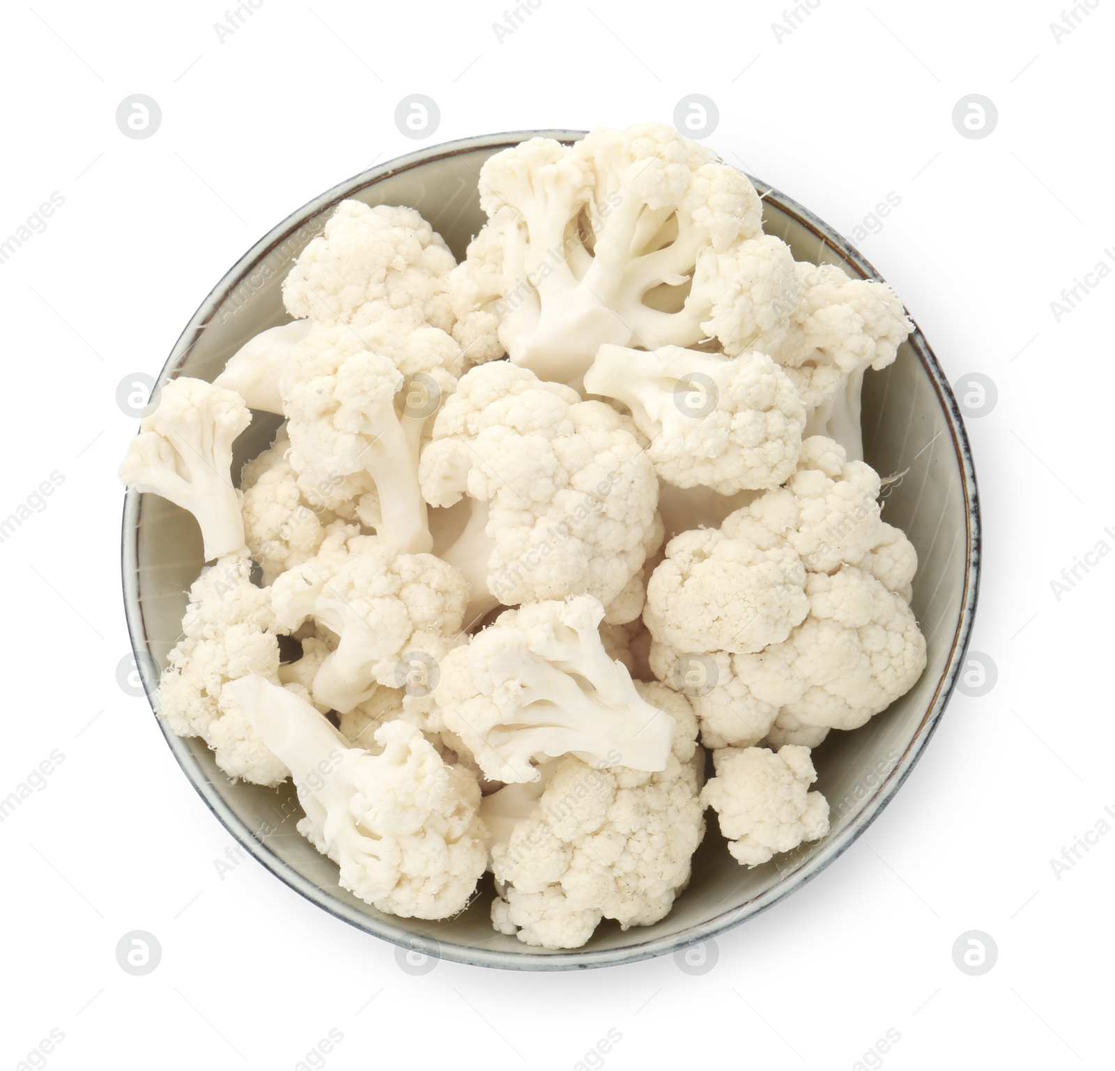Fresh cauliflower florets in bowl isolated on white, top view Photo of Fresh cauliflower florets in bowl isolated on white, top view