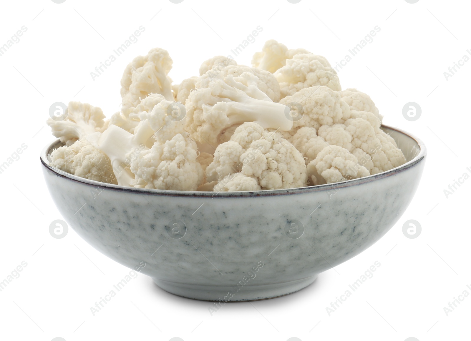 Fresh cauliflower florets in bowl isolated on white Photo of Fresh cauliflower florets in bowl isolated on white